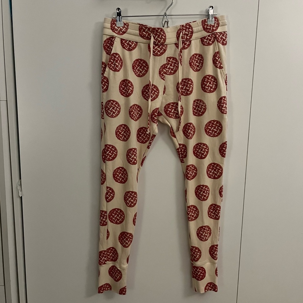 kate quinn Cream Joggers with Red Pie face Print. 100% Organic Cotton. Size Med.
